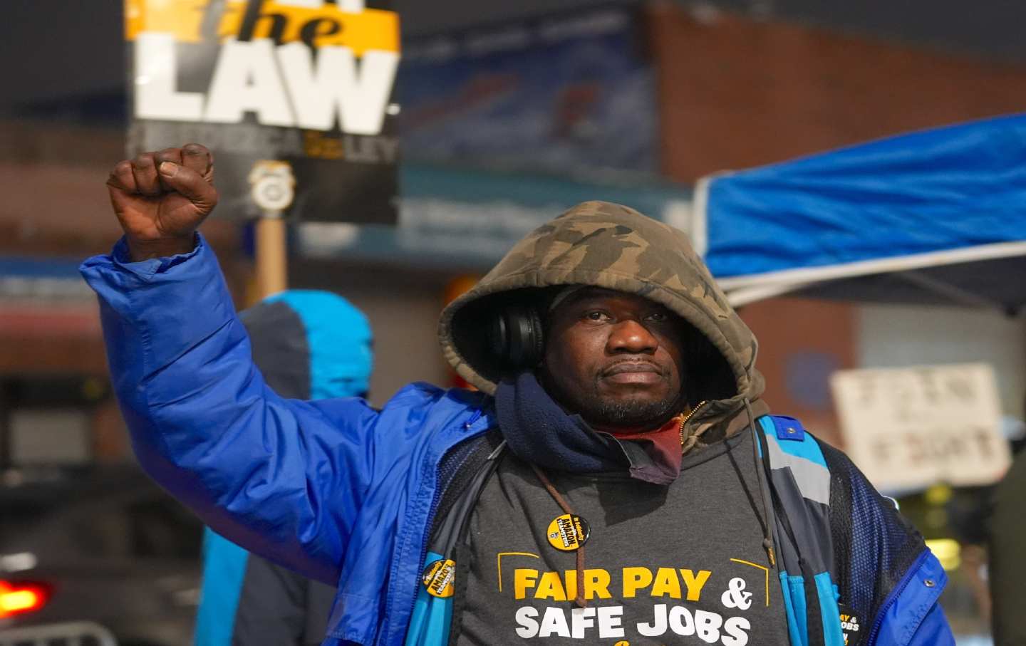 An Amazon worker affiliated with the Teamsters on strike at a company delivery hub in Maspeth, Queens, last year.