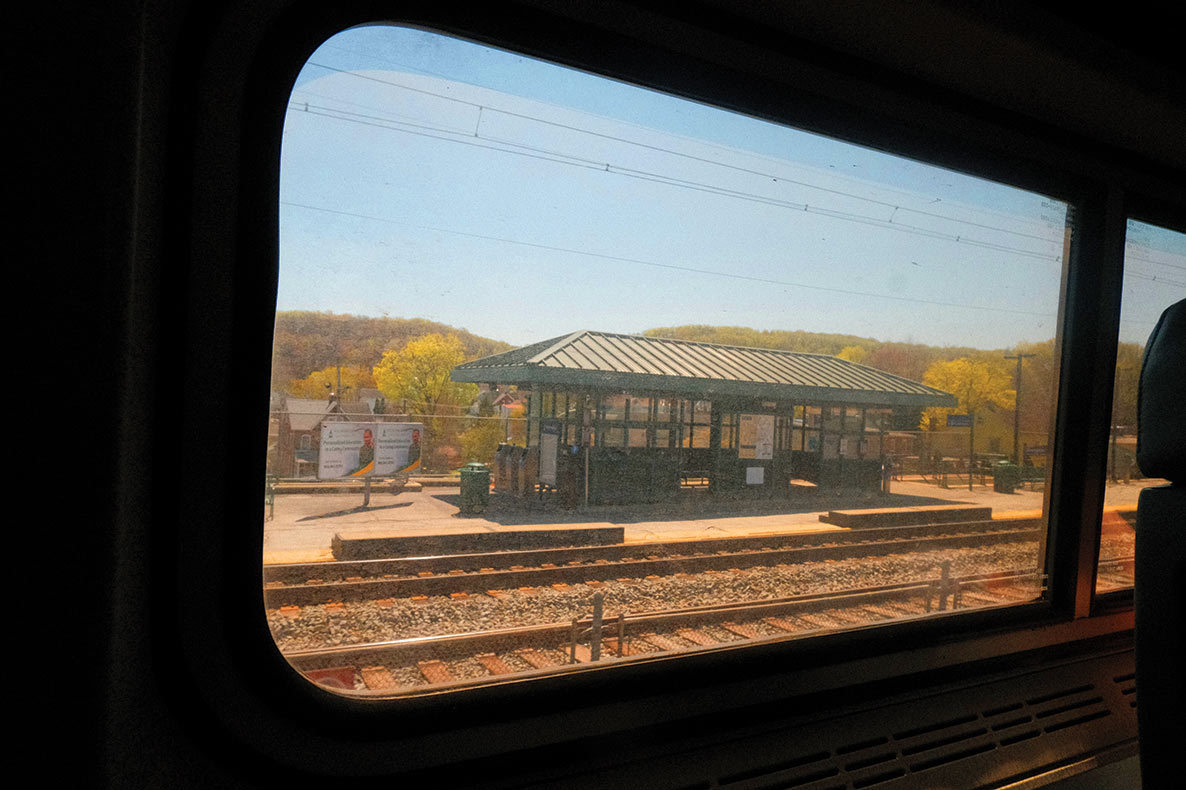 A train station on the Keystone Corridor line in Downington, Pennsylvania, as seen from the window of a coach car.