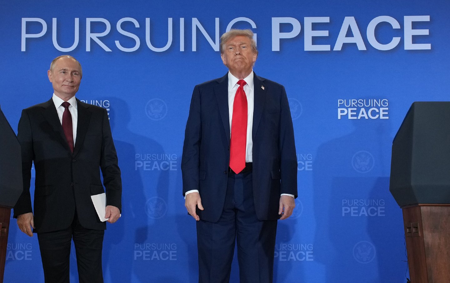 US President Donald Trump and Russian President Vladimir Putin leave at the conclusion of a press conference at Joint Base Elmendorf-Richardson on August 15, 2025, in Anchorage, Alaska.